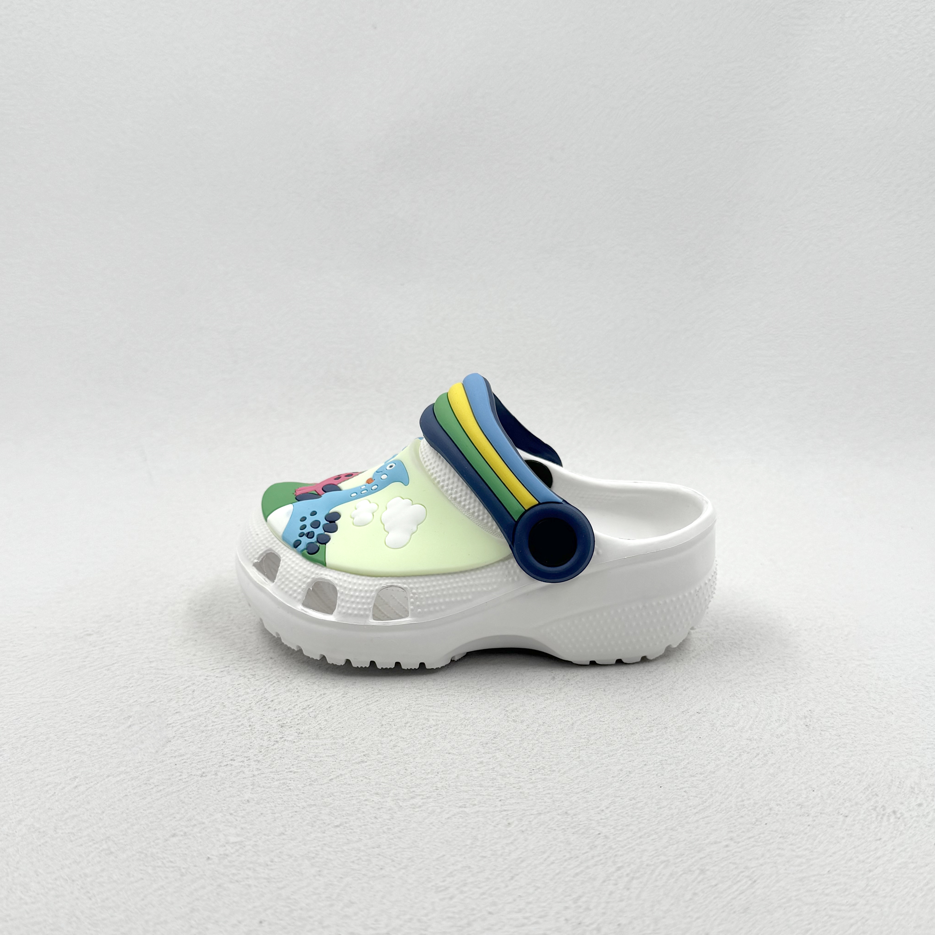 KIDS CLASSIC GRAFIC DINOSAUR EVA CLOGS WITH RANBOW BACK STRAP